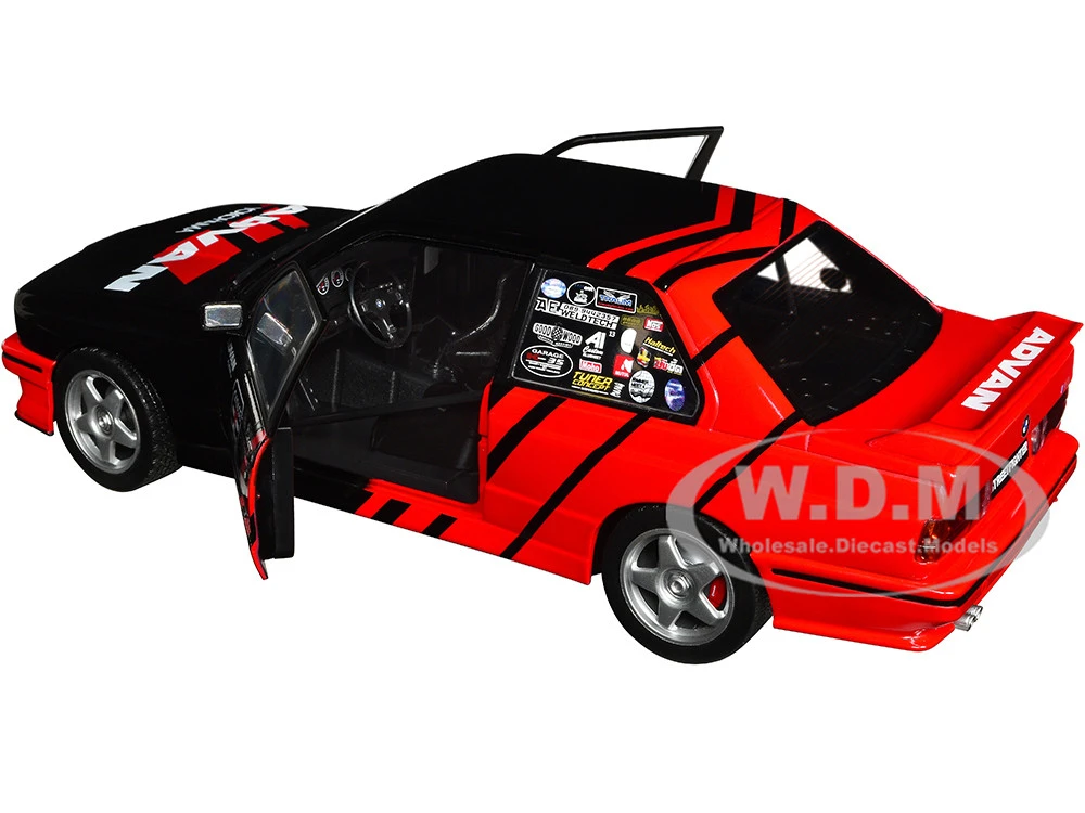 1990 BMW E30 M3 Black And Red With Graphics "ADVAN Drift Team" "Competition" Series 1/18 Diecast Model Car By Solido 2 1990 BMW E30 M3 Black And Red With Graphics "ADVAN Drift Team" "Competition" Series 1/18 Diecast Model Car By Solido - Image 2